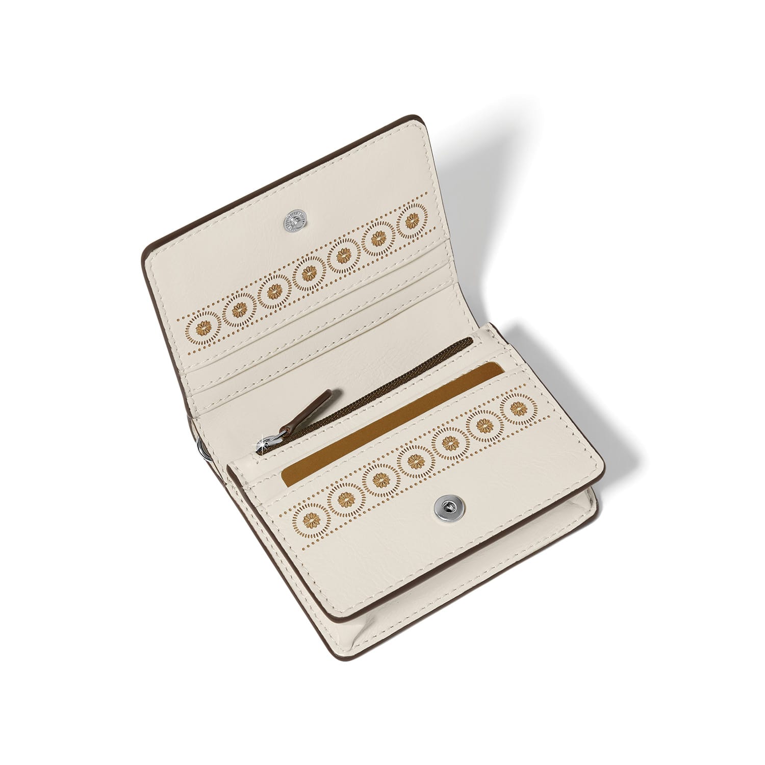 Brighton bifold wallet shown open with cream interior, gold medallion print, card slots, and zippered pocket on a white background