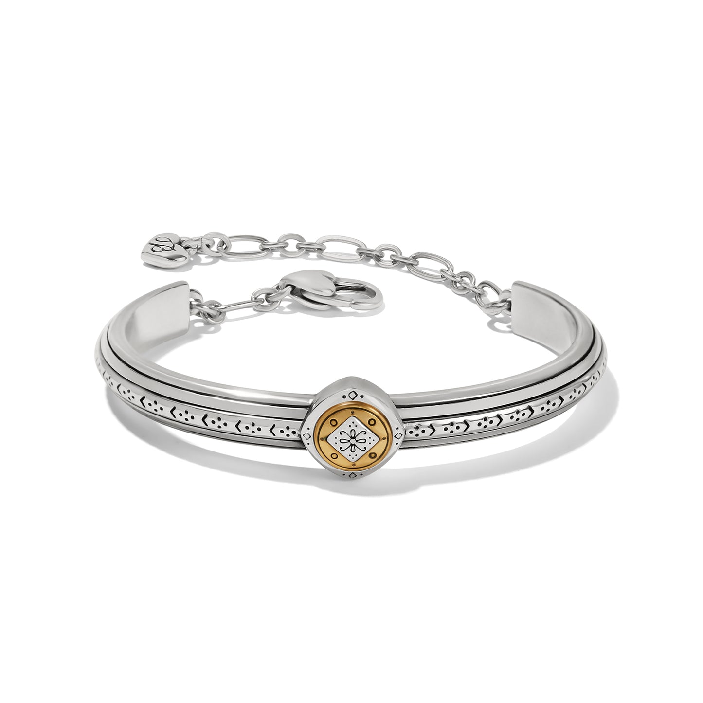 Brighton two-tone cuff bracelet with silver band, etched detailing, gold medallion center, and chain closure on a white background
