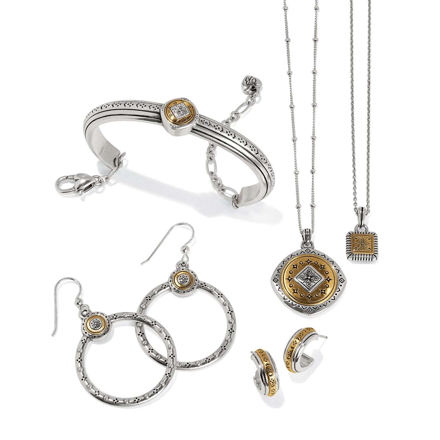 Brighton two-tone jewelry set styled with a bangle bracelet, hoop earrings, and pendant necklaces on white background