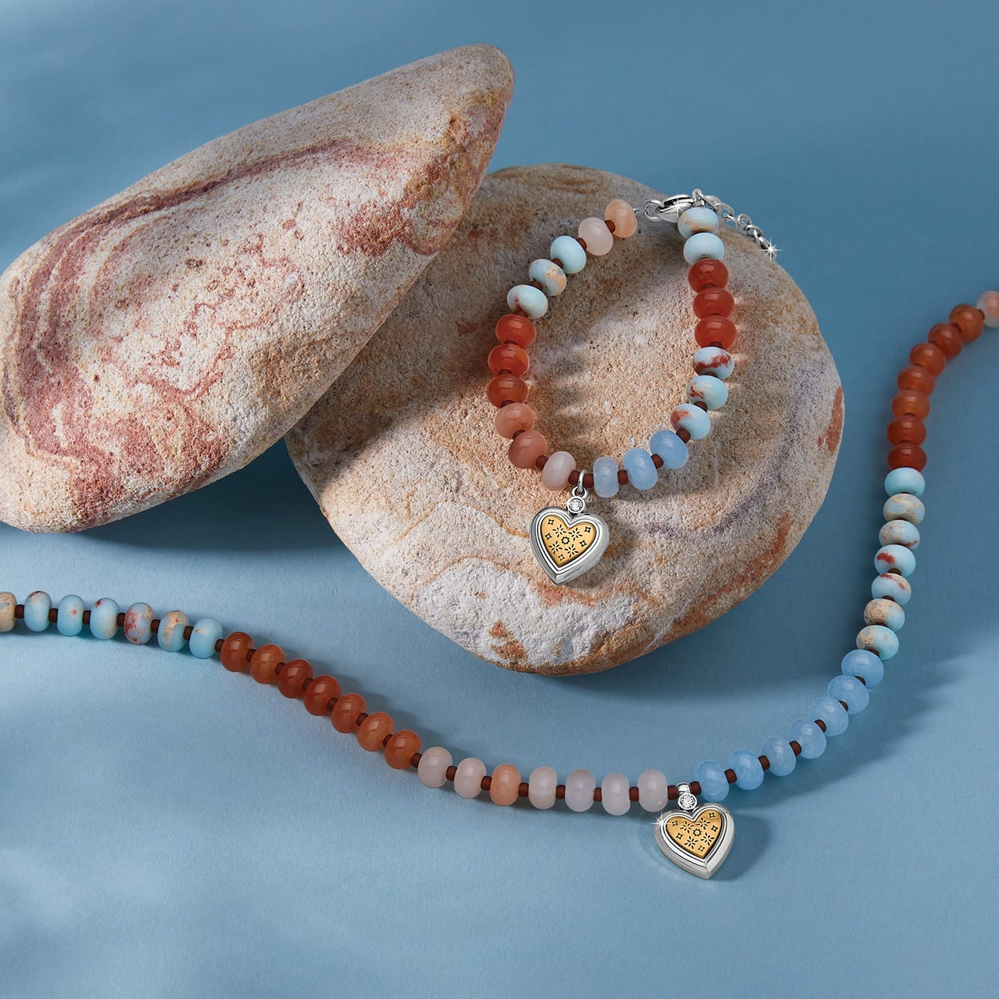 Brighton beaded jewelry set with silver-plated heart charms and crystal accents, styled with natural stones