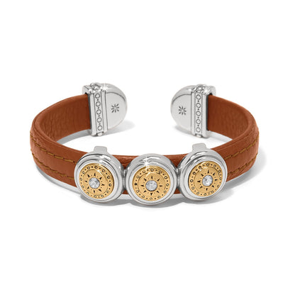Brighton leather cuff bracelet in tan with two-tone medallions and crystal centers on a white background