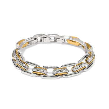 Brighton link bracelet in two-tone silver and gold finish with floral engraved detailing on a white background