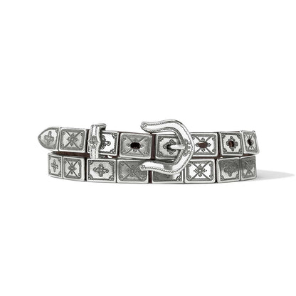 Brighton leather belt with engraved silver-tone square conchos and ornate buckle, coiled on a white background