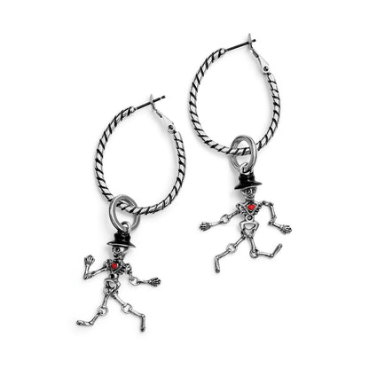 Brighton hoop earrings with silver-plated skeleton charms wearing top hats and red enamel hearts on a white background