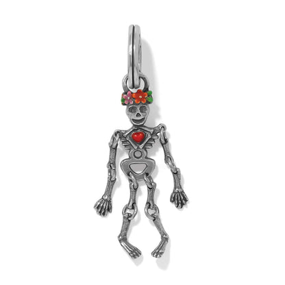 Brighton skeleton charm with silver-plated articulated body, red enamel heart, and floral crown on a white background