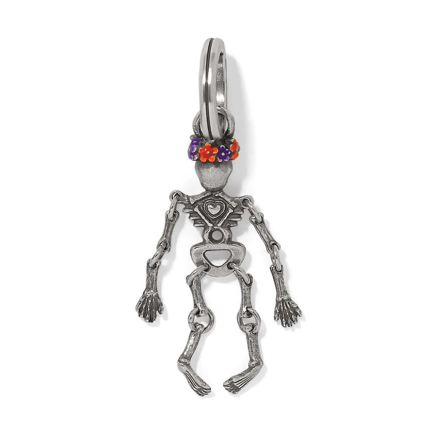 Brighton silver-plated skeleton charm with articulated limbs and colorful enamel floral crown on a white background