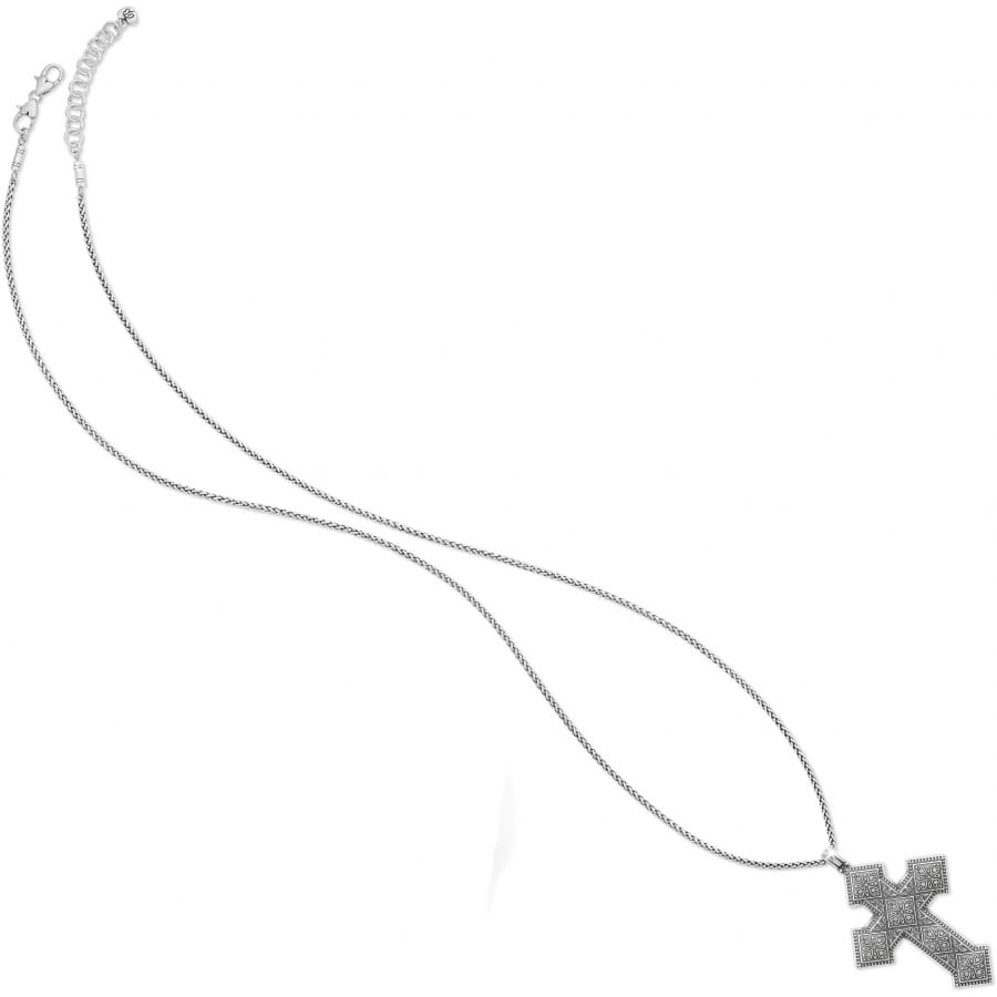Brighton pendant necklace with silver-plated ornate cross pendant and long thin chain on a white background