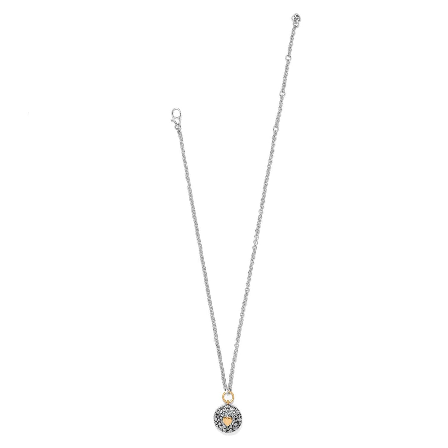 Brighton pendant necklace with two-tone chain and crystal-covered disc featuring gold heart accent on a white background