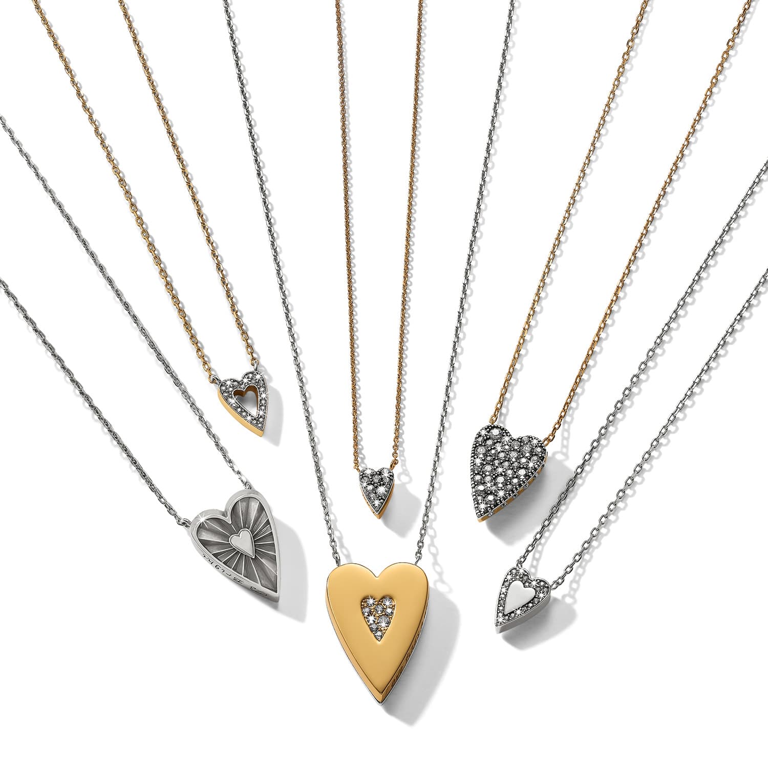 Brighton heart pendant necklaces in two-tone finish with crystal accents in assorted sizes on a white background