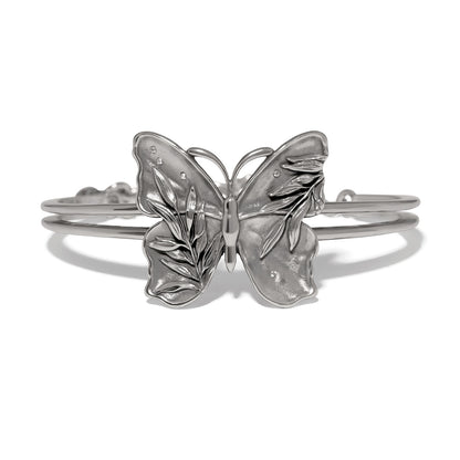 Brighton butterfly cuff bracelet with silver-tone wings, leaf detailing, and crystal accents on a white background