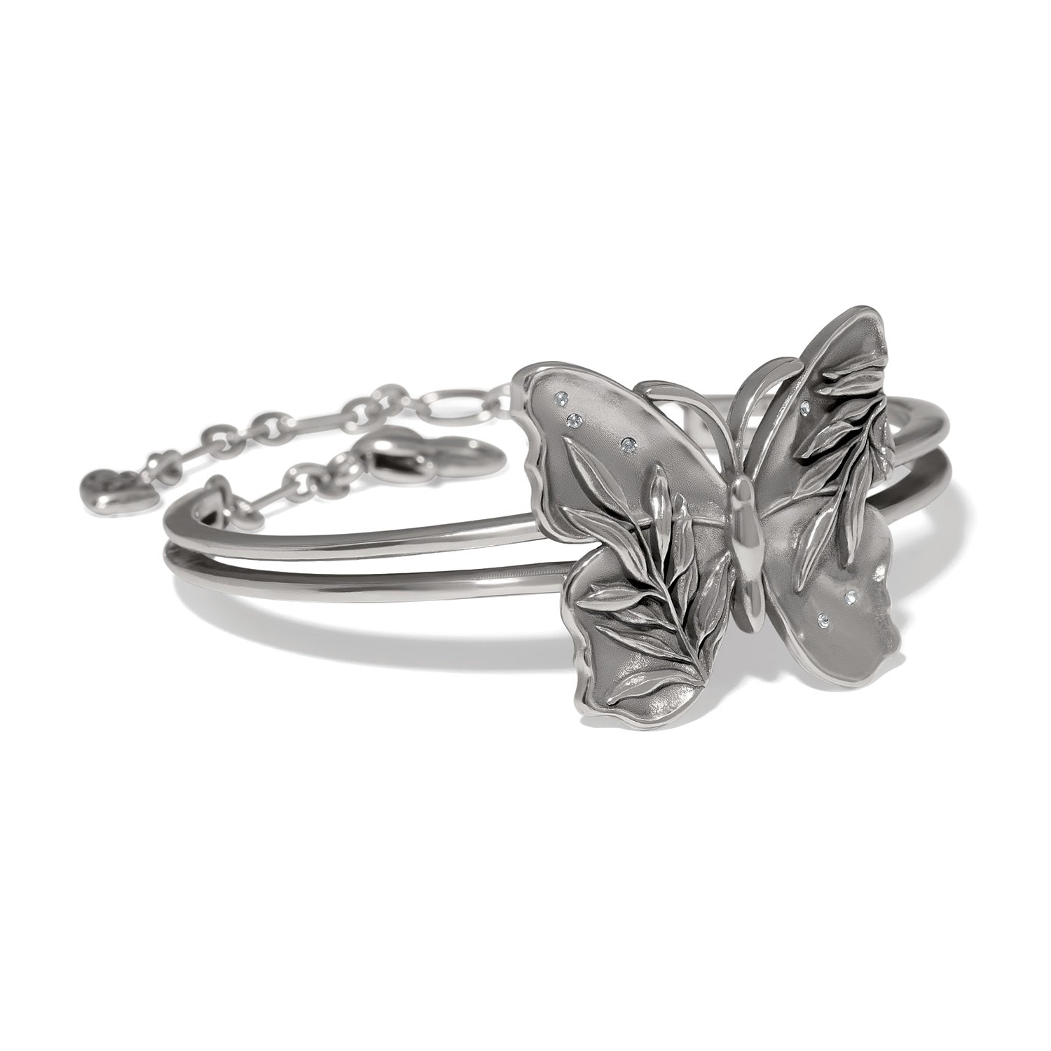 Brighton hinged bangle bracelet with silver-tone butterfly centerpiece featuring leaf detailing and crystal accents on a white background