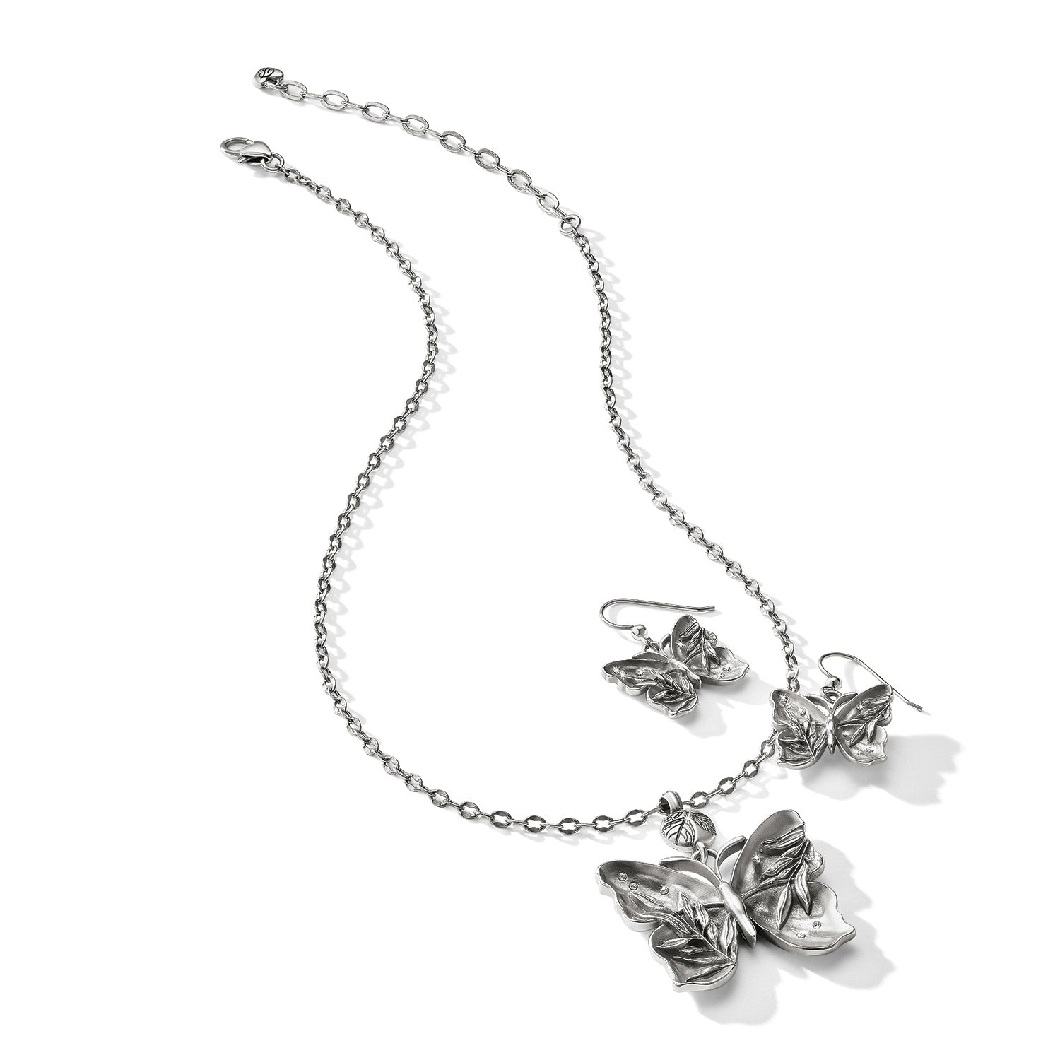 Brighton silver-plated butterfly pendant necklace with matching drop earrings featuring leaf-textured wings on a white background