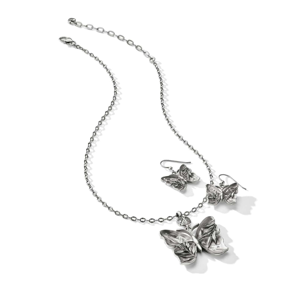 Brighton silver-plated butterfly pendant necklace with matching drop earrings featuring leaf-textured wings on a white background