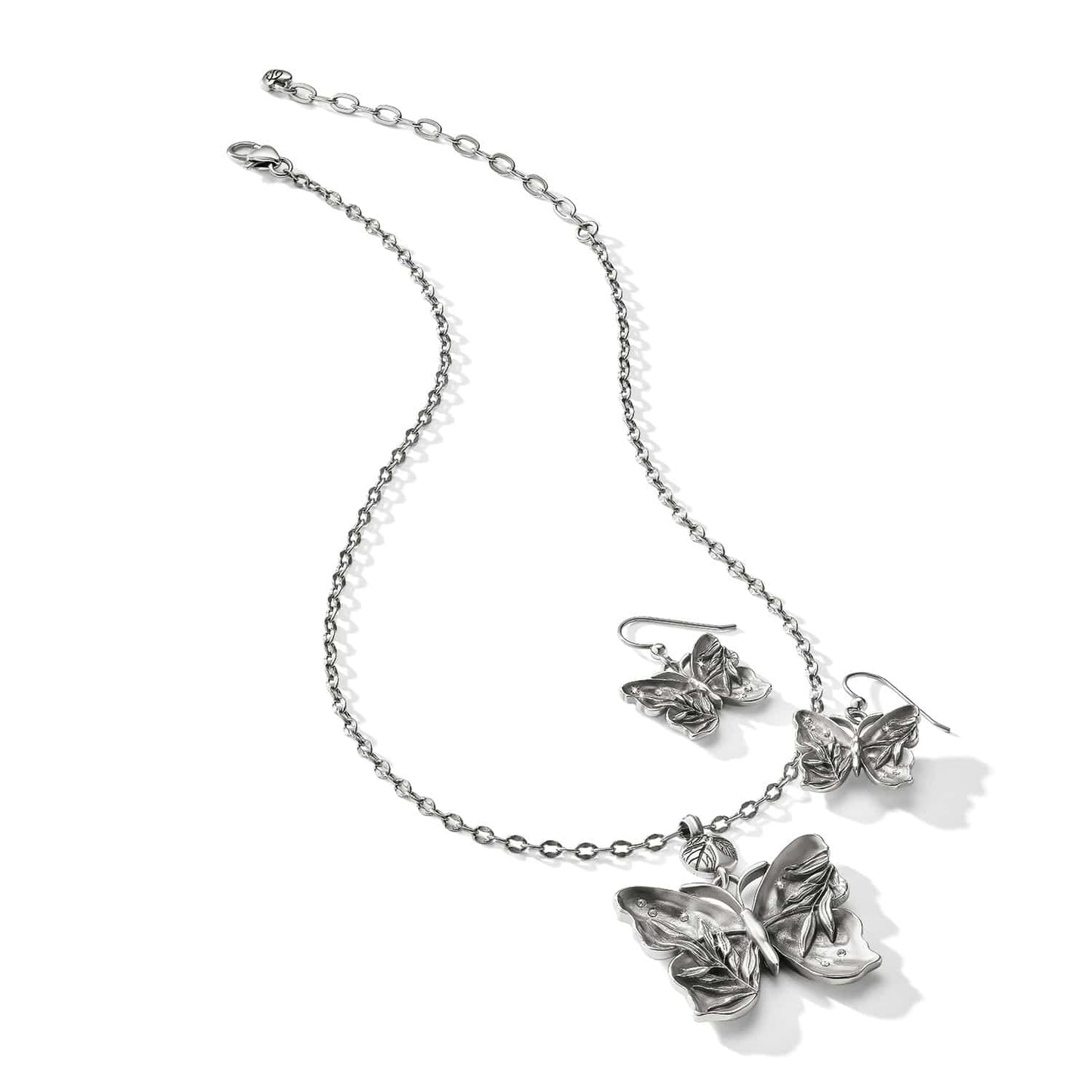 Brighton silver-plated butterfly pendant necklace with matching drop earrings featuring leaf-textured wings on a white background