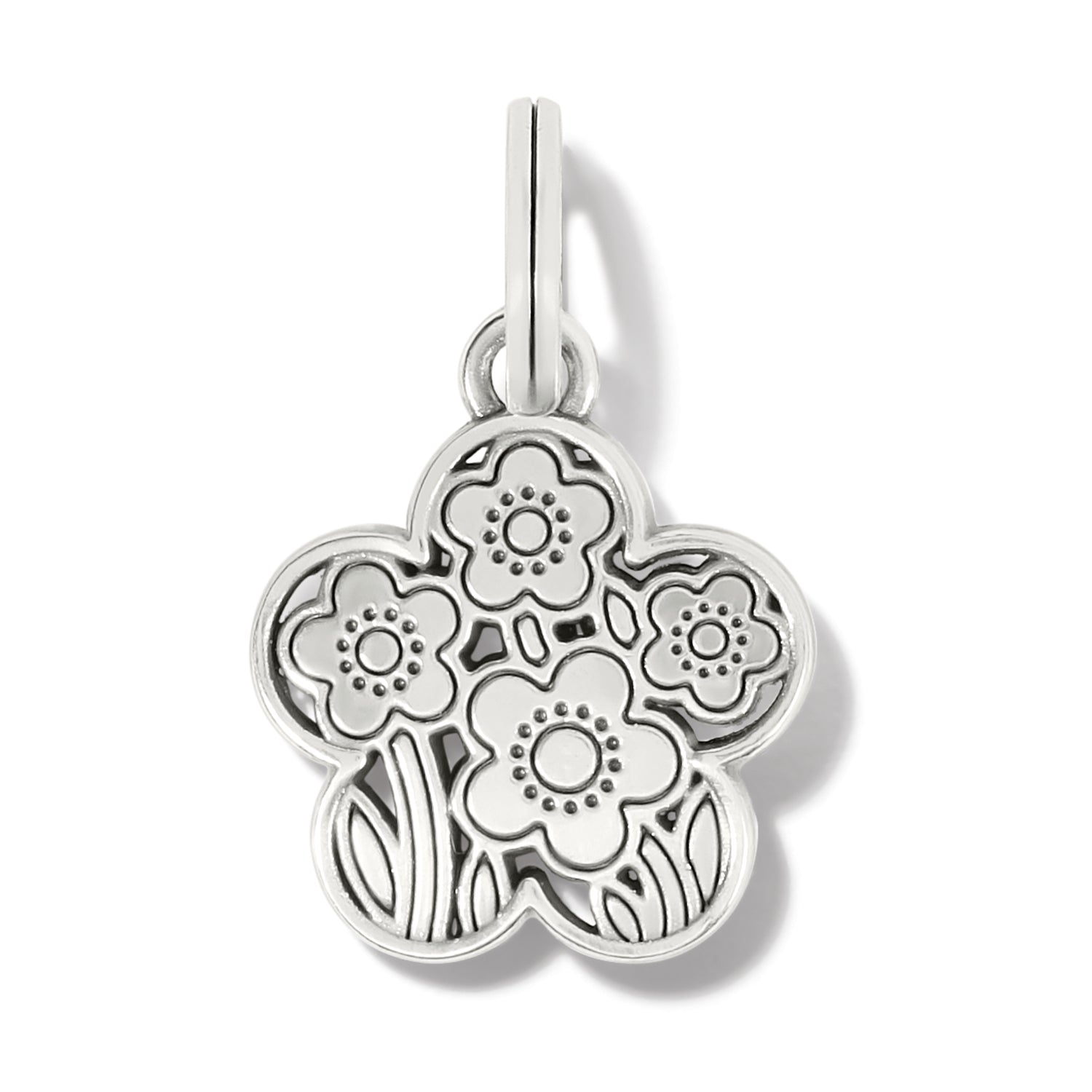 Brighton silver-plated flower charm pendant with engraved daisy and leaf details on a white background