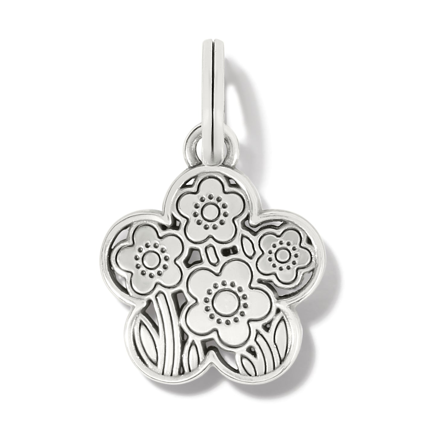 Brighton silver-plated flower charm pendant with engraved daisy and leaf details on a white background