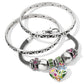 Brighton silver-plated bracelet set with two engraved bangles and mesh charm bracelet featuring enamel floral heart on a white background