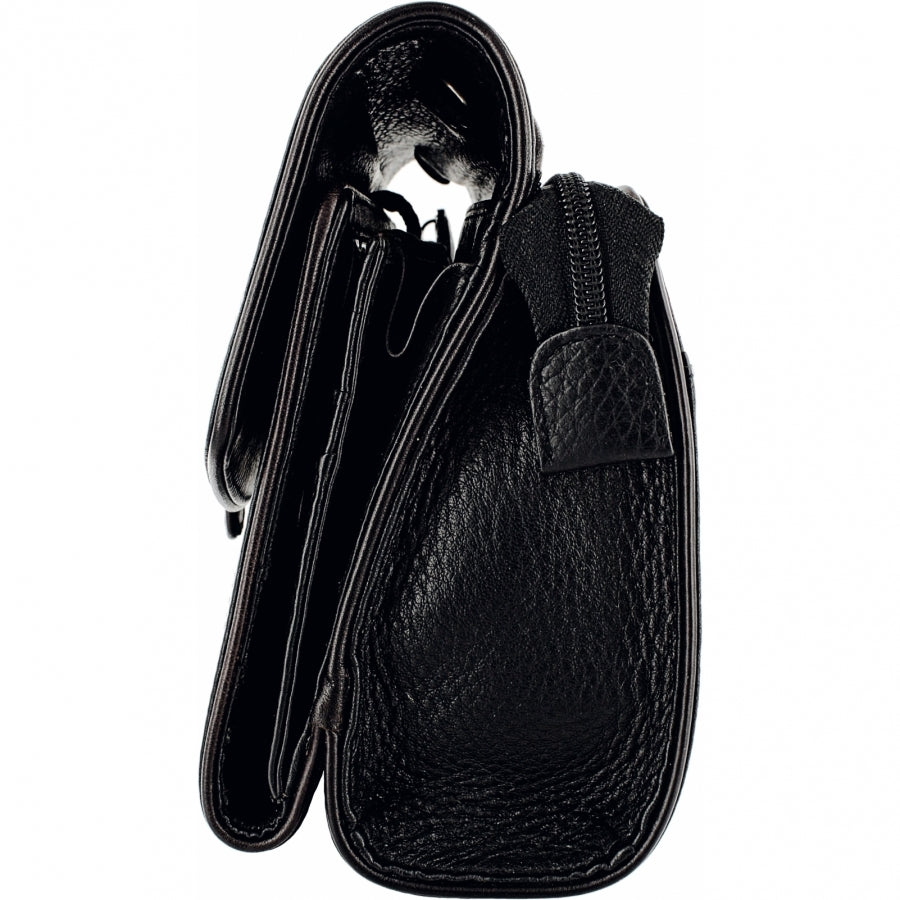 Brighton handbag side view in black pebbled leather with zipper closure and tab pull on a white background