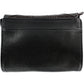 Brighton handbag shown from the back with black pebbled leather and brown croc-embossed trim on a white background