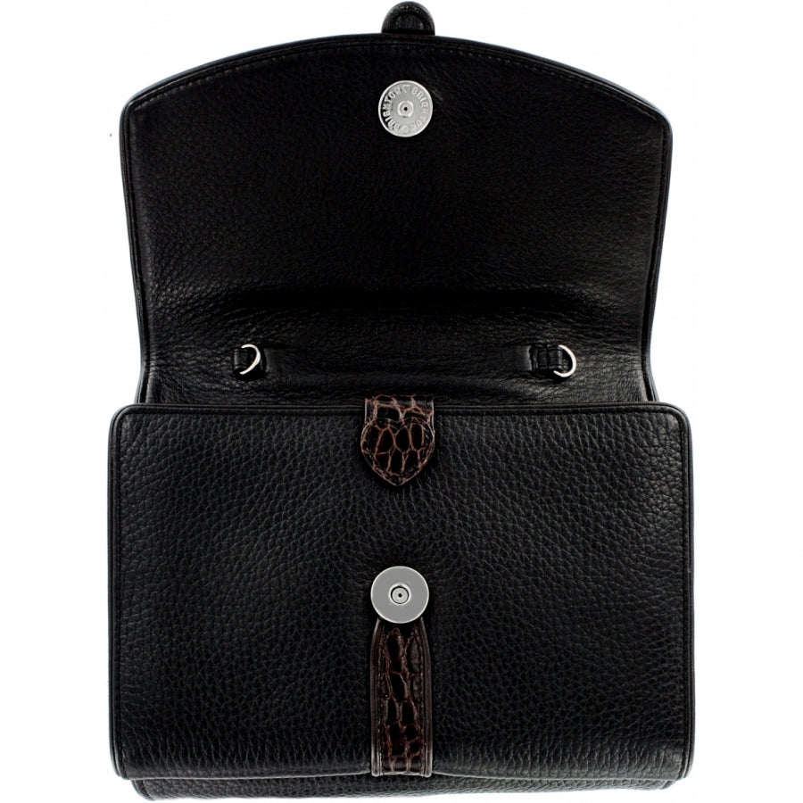 Brighton black leather handbag shown open with interior view, croc-embossed strap, and silver-tone snap closures on a white background
