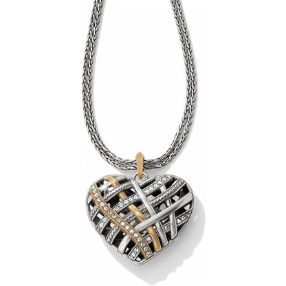 Brighton pendant necklace with silver-plated woven heart, gold-tone accents, and crystal details on a white background