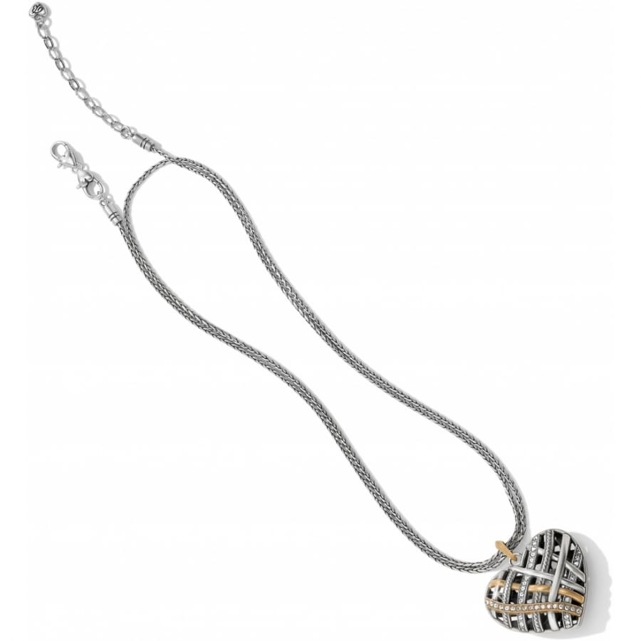 Brighton pendant necklace with silver-plated woven heart, crystal accents, and gold-tone details on a white background