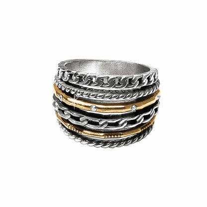 Brighton ring with stacked two-tone silver and gold bands featuring chain, rope, and crystal accents on a white background