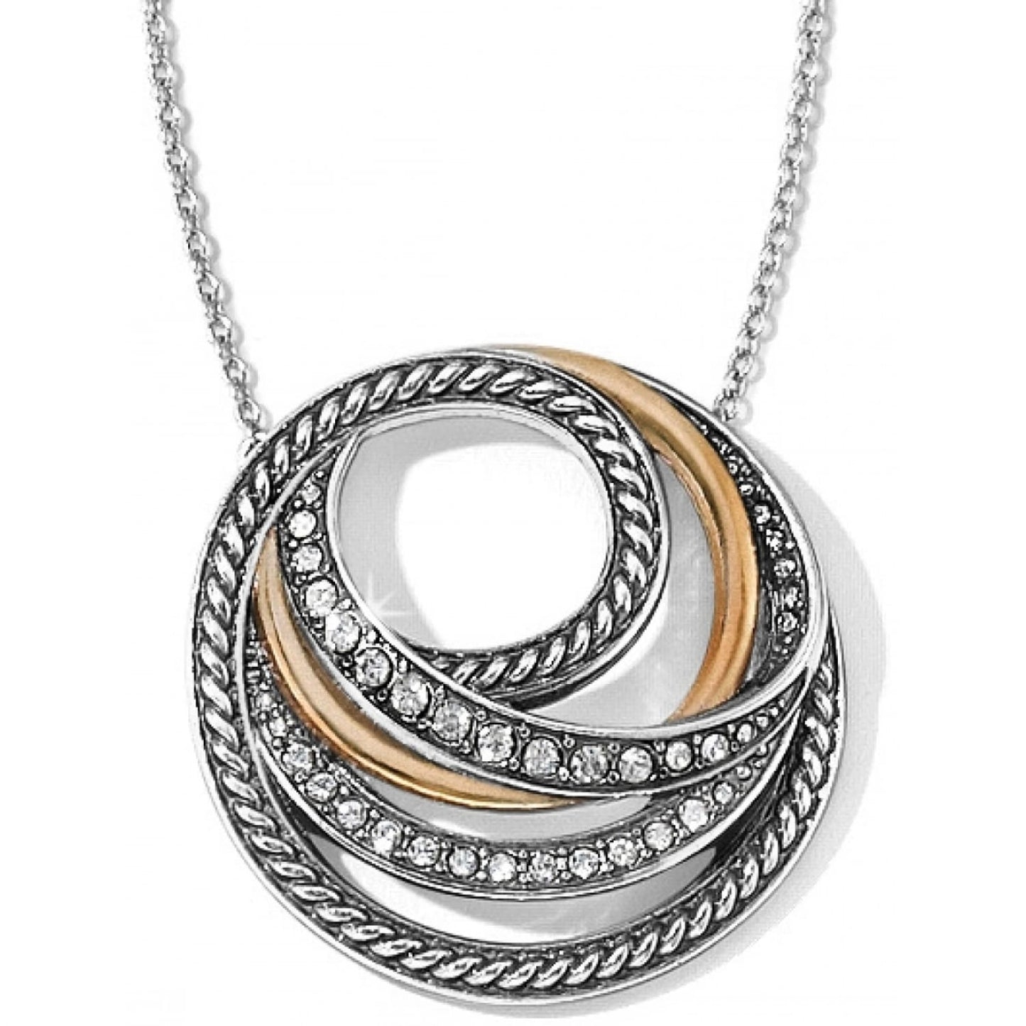 Brighton pendant necklace with silver-plated and gold-tone swirled rings accented with fine quality crystal on a white background