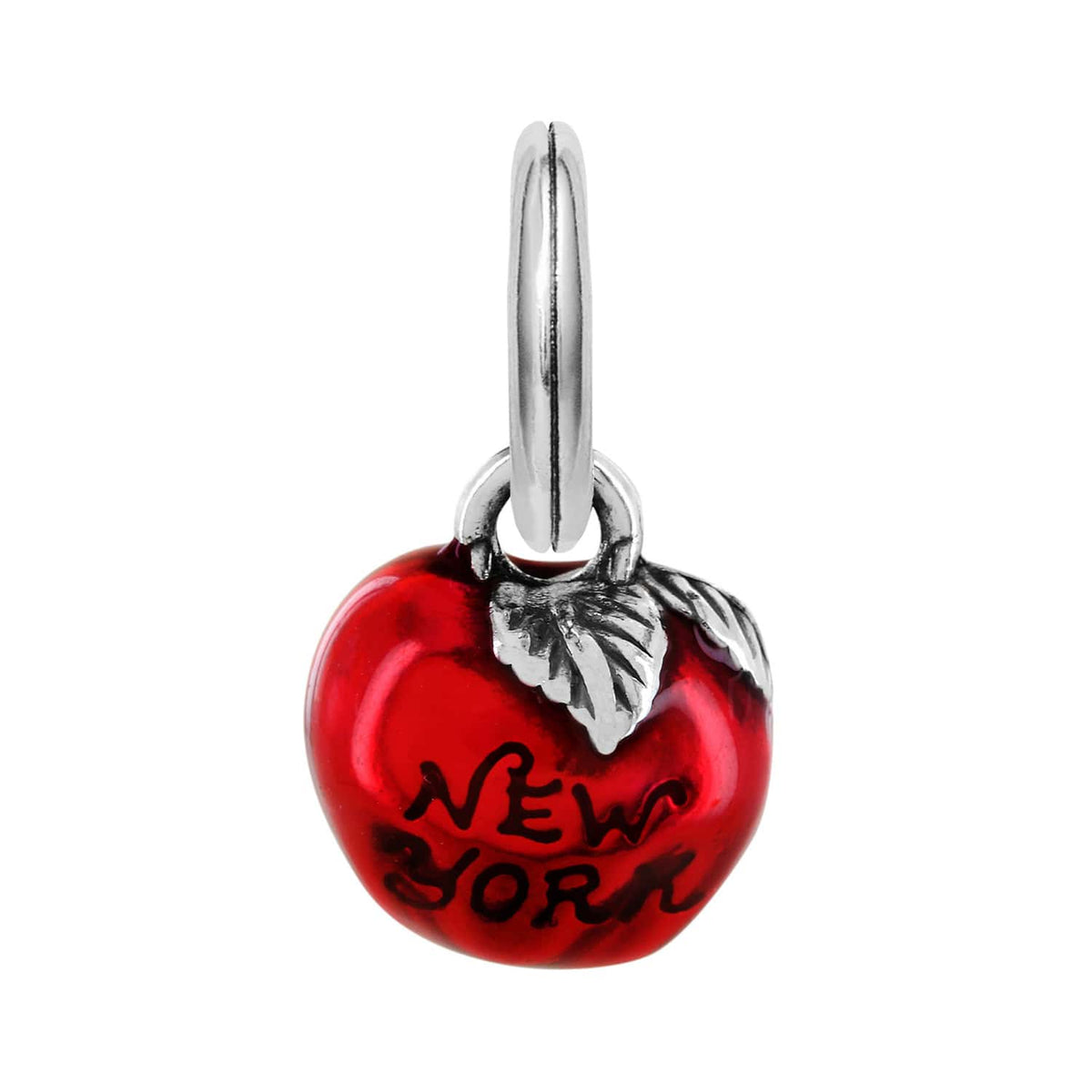Brighton apple charm with red enamel finish, silver-tone leaf, New York lettering, and split ring on a white background