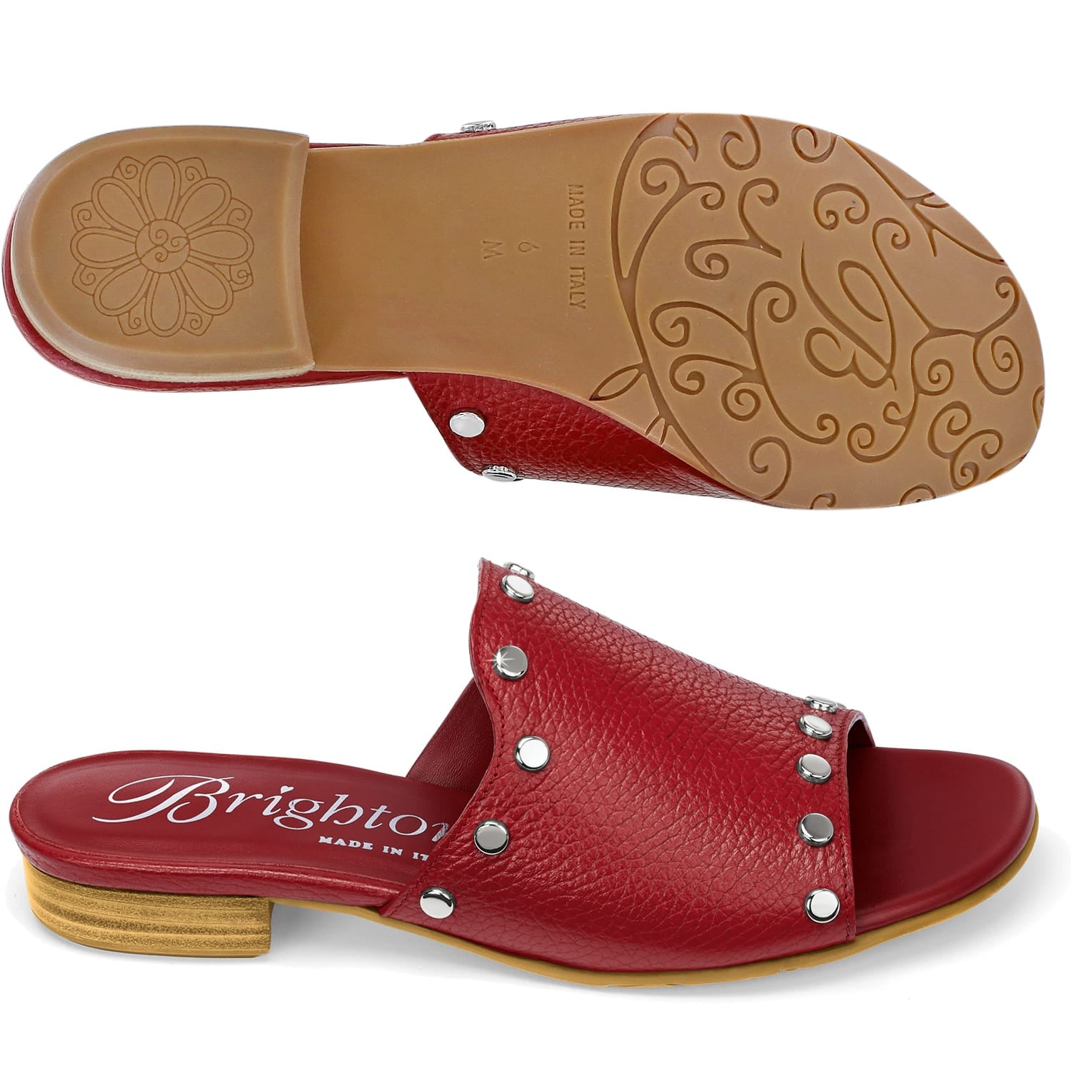 Brighton red leather slide sandals with silver-tone studs, low heel, and patterned sole shown from below on a white background