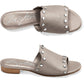 Brighton metallic taupe leather slide sandals with silver-tone studs, shown from top and side views, on a white background