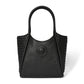 Brighton black leather tote handbag with woven side panels, circular medallion emblem, and dual top handles on a white background