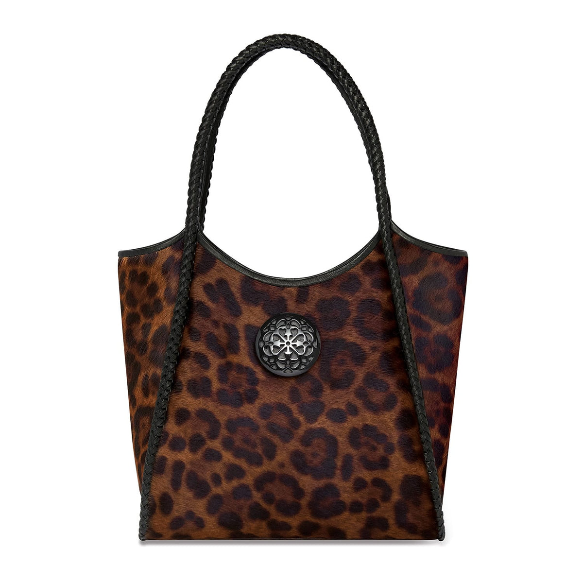 Brighton tote handbag with leopard print calf hair, braided black leather straps, and circular medallion accent on a white background