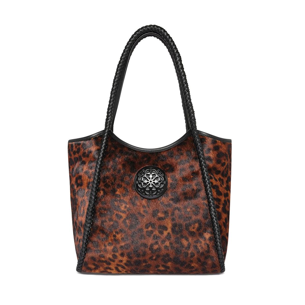 Brighton tote handbag with leopard print body, braided black leather straps, and round medallion accent on a white background