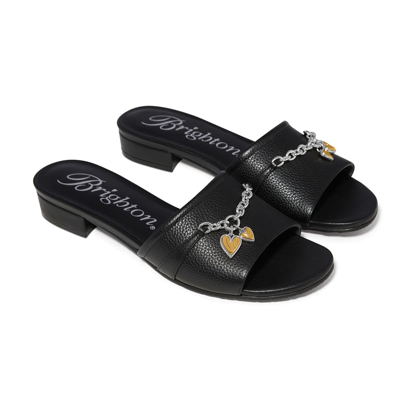 Brighton black leather slide sandals with silver-tone chain and gold heart charm accents on a white background