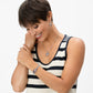 Model wearing a Brighton silver-plated heart pendant necklace with red, white, and blue crystals and coordinating Brighton accessories
