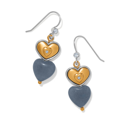 Brighton drop earrings with two-tone heart charms, blue stone hearts, and crystal accents on a white background