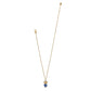 Brighton pendant necklace with two-tone heart charm, blue stone heart drop, and crystal accents on a white background