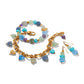 Brighton gold-plated bracelet set and drop earrings with multicolored heart-shaped gemstone beads and crystals on a white background