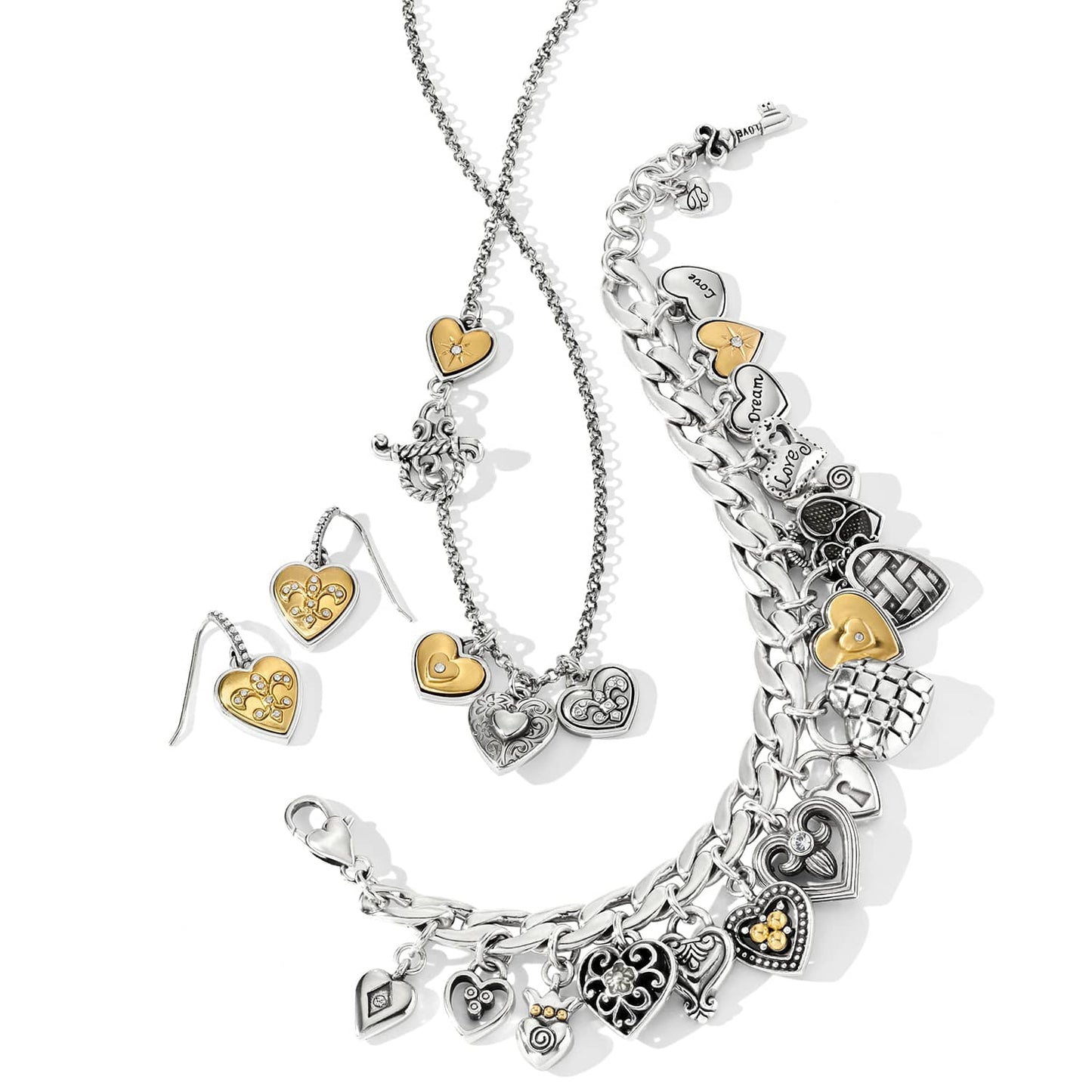 Brighton heart jewelry set styled with charm bracelet and earrings in two-tone silver and gold finish