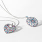 Brighton silver-plated pendant necklaces with heart and round shapes featuring multicolored crystals on a white background