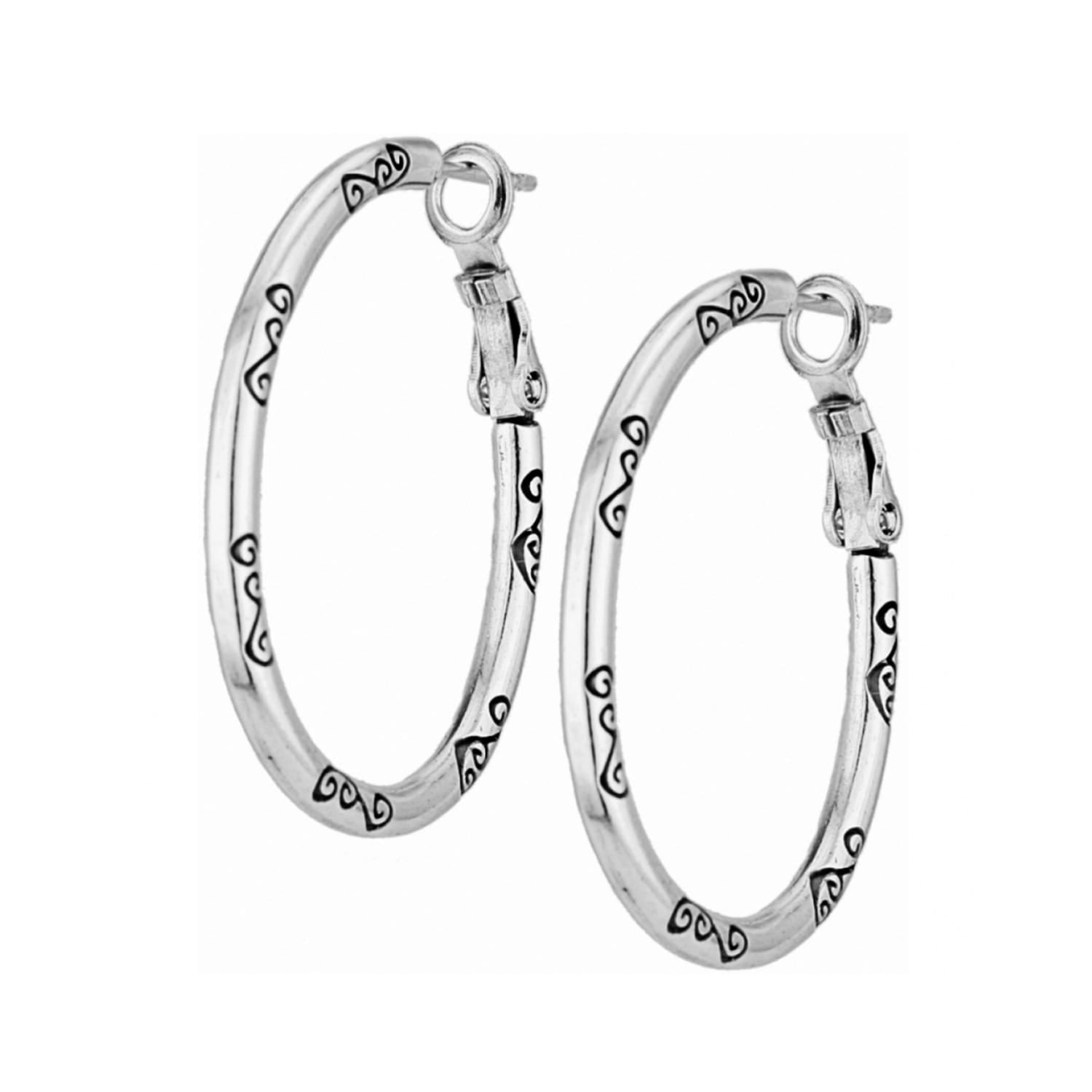 Brighton hoop earrings with silver-tone finish and engraved scroll detailing along the bands on a white background