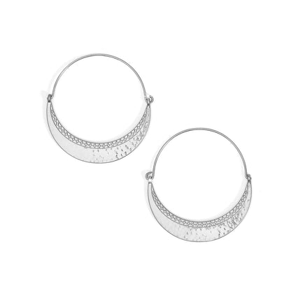Brighton hoop earrings with silver-plated crescent crests featuring hammered texture and etched scalloped pattern on a white background