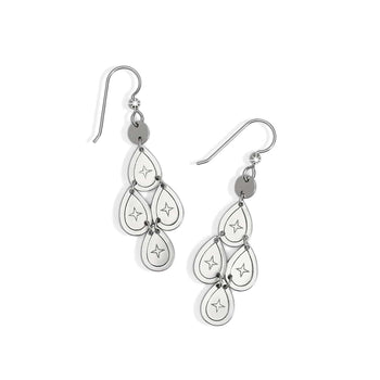 Brighton chandelier drop earrings with silver-plated teardrop charms featuring engraved star details on a white background