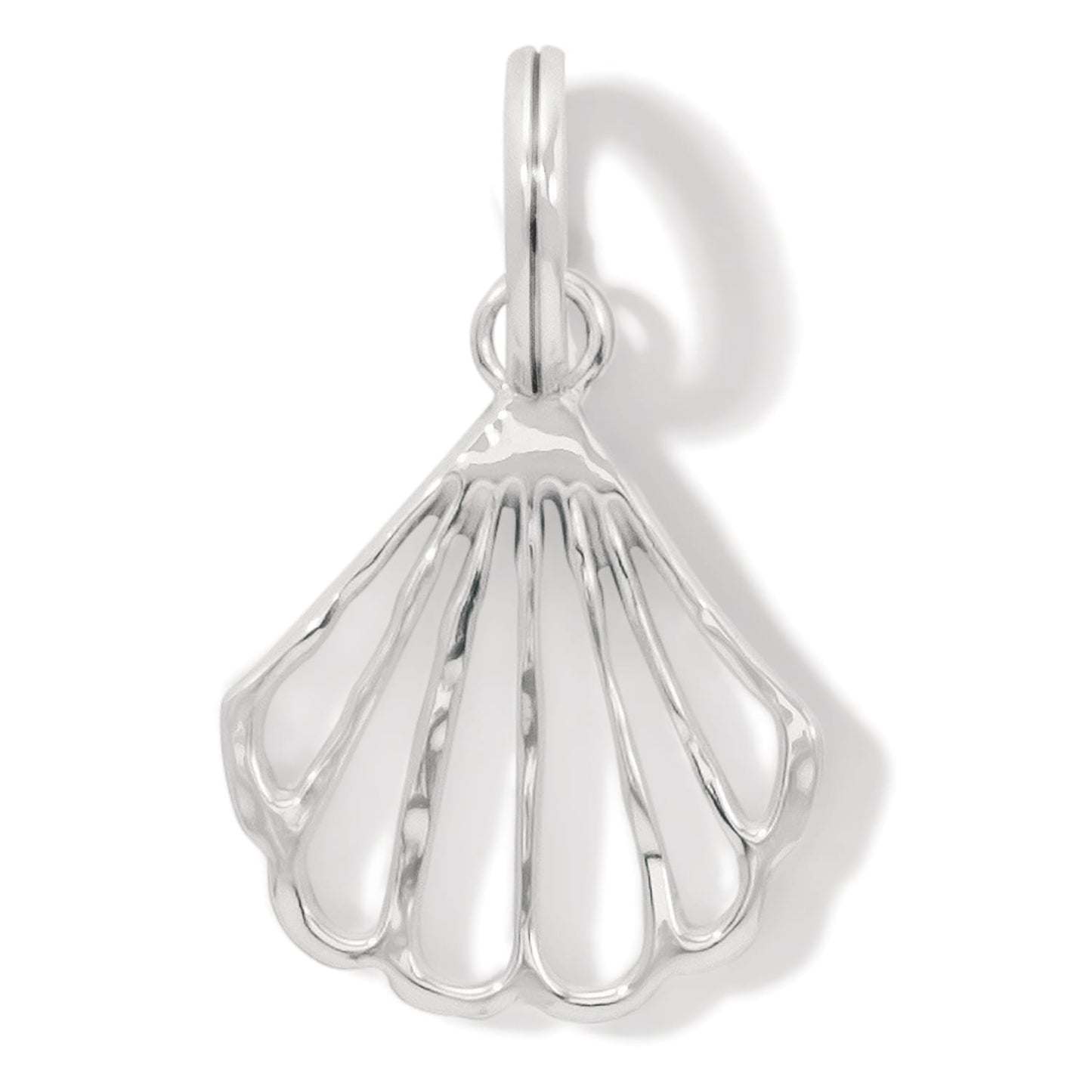 Brighton seashell charm with silver-plated openwork fan design and polished bail loop on a white background