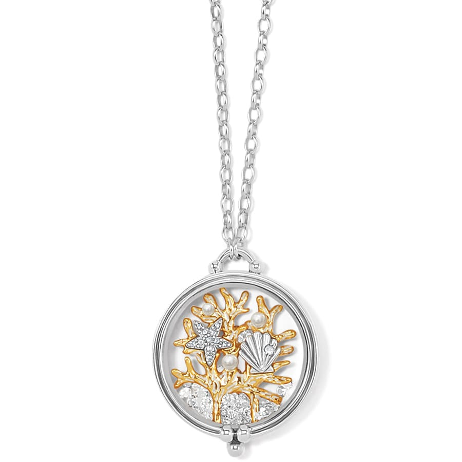 Brighton pendant necklace with two-tone coral, starfish, seashell, crystals, and glass pearls on a white background