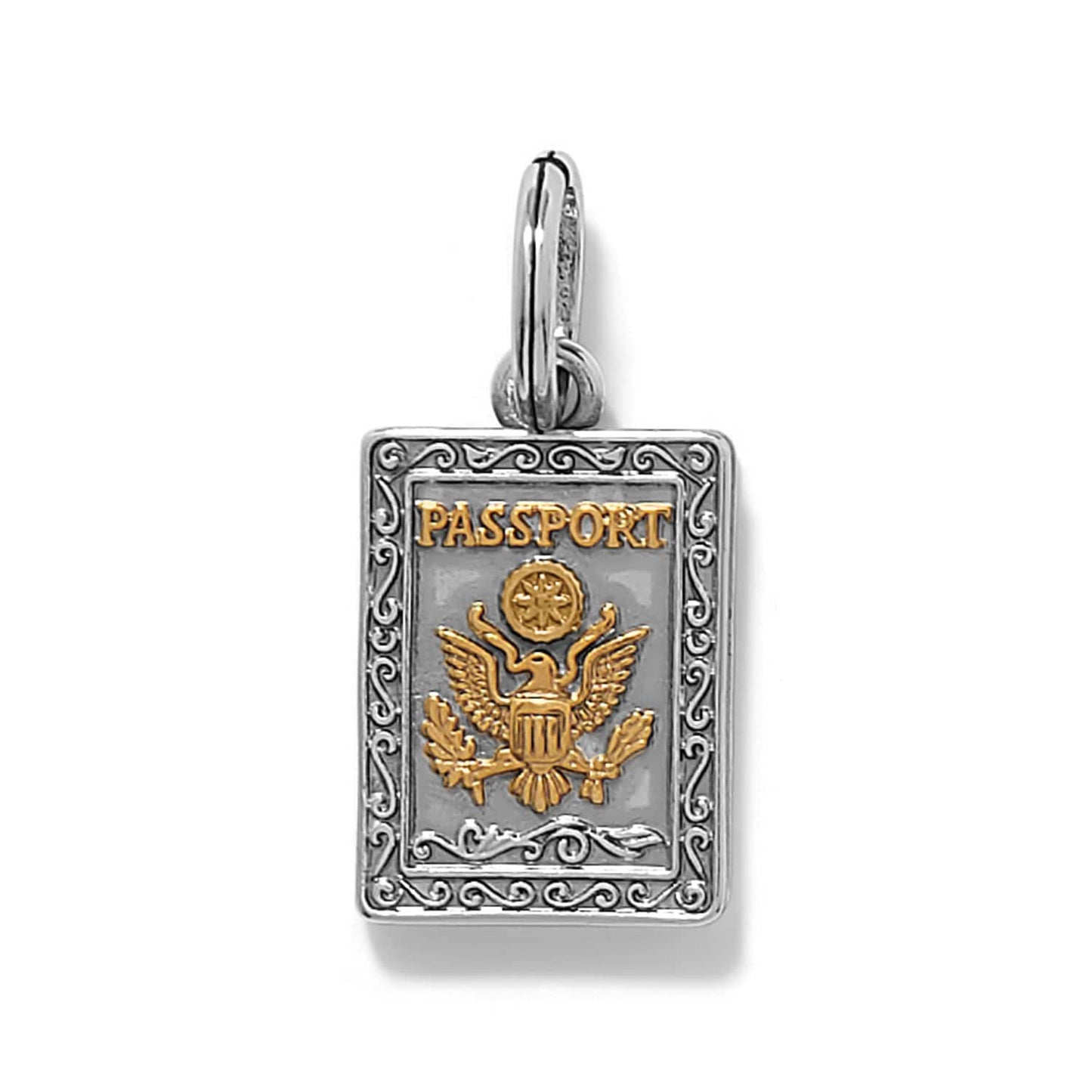 Brighton passport charm with gold-tone eagle emblem and silver-tone scrollwork border frame on a white background
