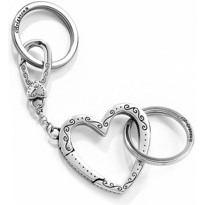 Brighton keychain with silver-plated heart ring, scroll engravings, lobster clasp, and two split rings on a white background