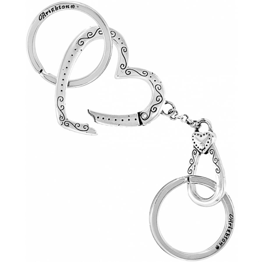 Brighton heart-shaped keychain with silver-plated scroll engraving, heart charm, and two split rings on a white background