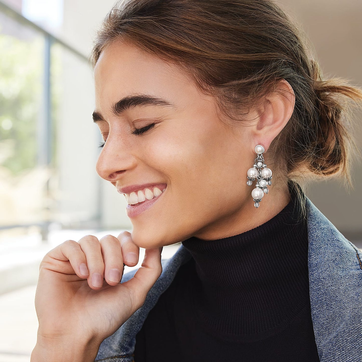 Model wearing Brighton silver-plated cluster drop earrings with fine quality glass pearls and crystal beads
